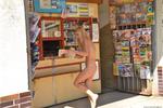 Nude-in-Public-Dominika-J-At-and-around-a-Bus-Station-and-at-a-Small-Stand-%28-a3n9unx4v1.jpg